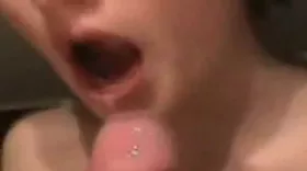 Big ejaculation in a teenager's mouth and nose